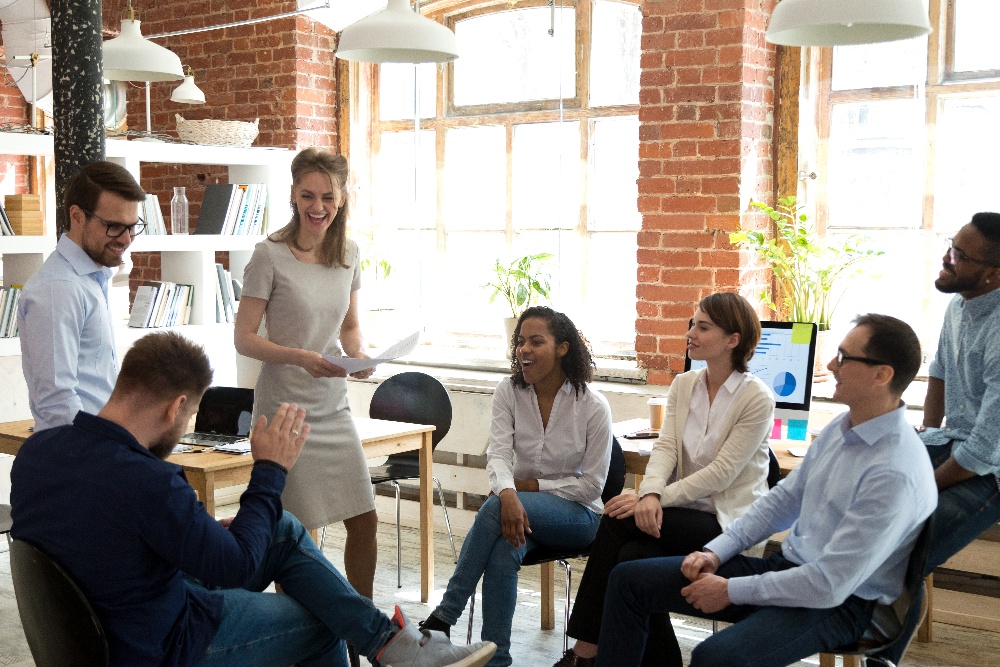 Group of people sitting in a circle and talking