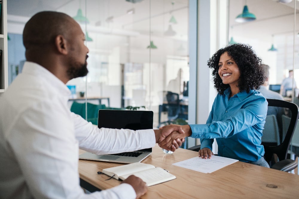 Two people shaking hands